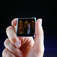 Illustration for article titled Here you go, be mad about and/or tickled by someone watching Tenet on an iPod Classic